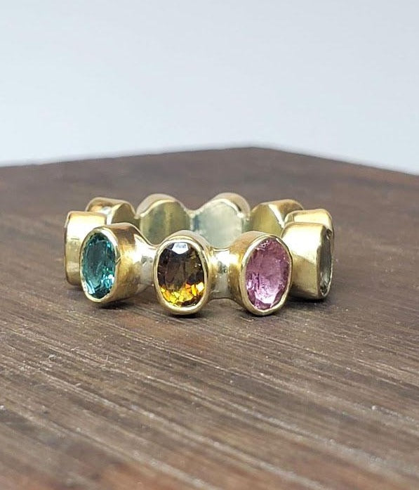 Bezel ring with tourmalines in gold