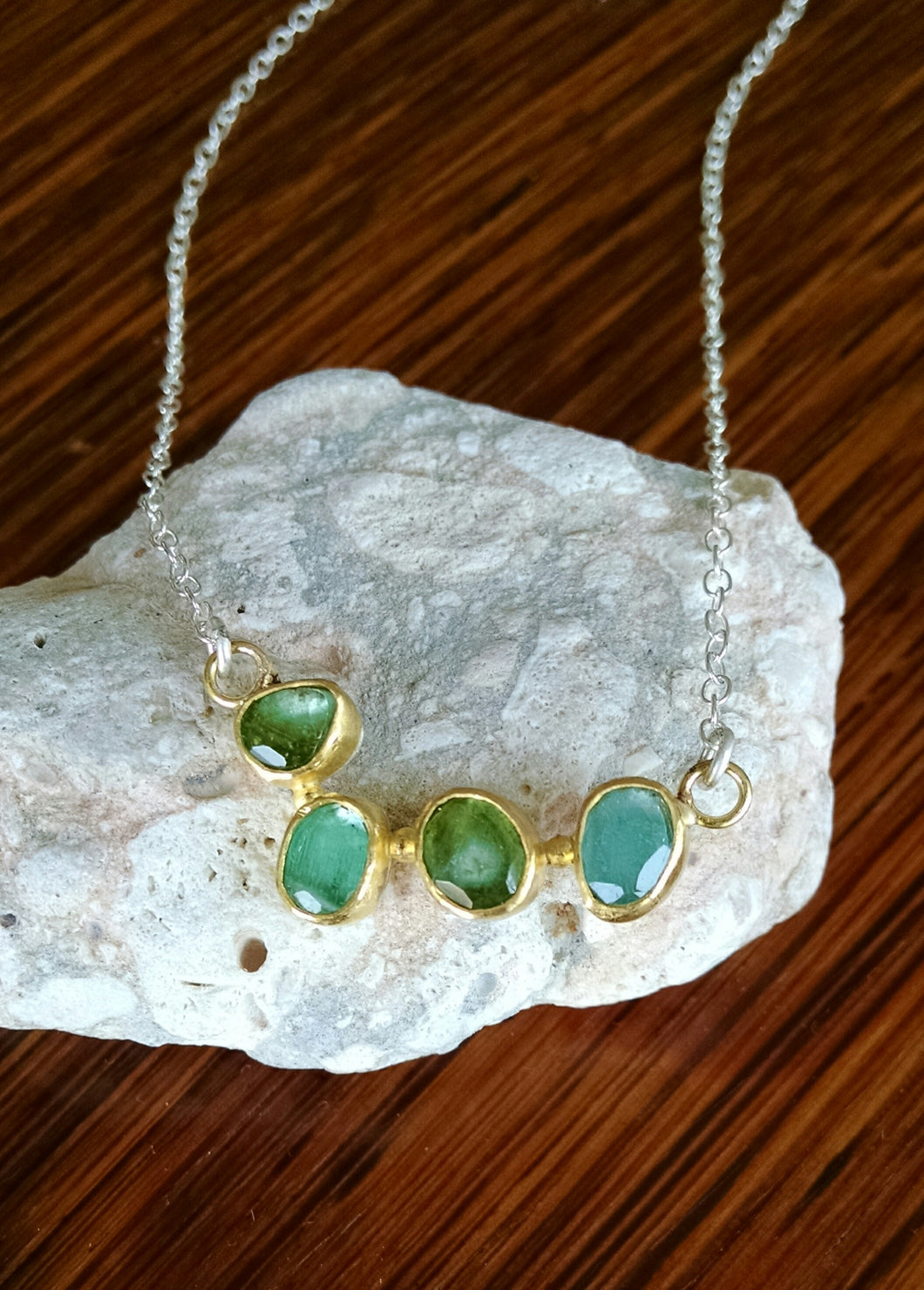 Four tourmalines in gold and silver necklace